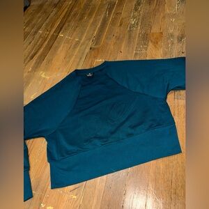 Nike Women's Dri-FIT FLocked Cropped Sweatshirt in size small